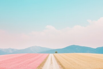 Fototapeta premium Dreamy Pastel Landscape of Split Fields with Distant Mountains and Serene Sky