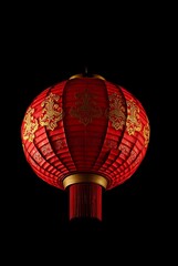 Obraz premium Glowing Red Lantern with Gold Accents Against a Dark Backdrop