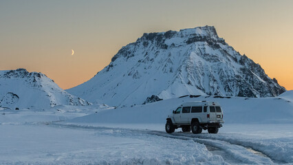 Beautiful sunset near Myrdalsjokull glacier on the south coast of Iceland. Winter road trip in an arctic winter environment © Alex Cooper