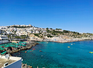 Boardwalk of the marina of Castro village at sunset, Lecce, Apulia (Puglia), Italy.	