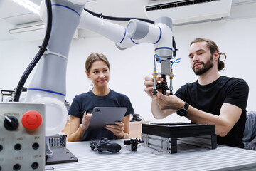 automation machine engineer students study and inspection control robot arm machine in robotics...