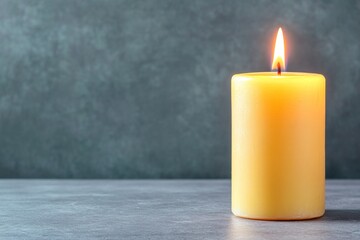 A close-up of a burning candle, the soft flame flickering in the dark, illuminating its surroundings