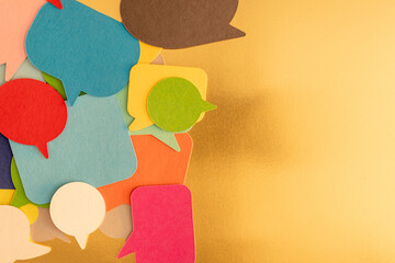 Colorful Speech Bubbles on Gold Background