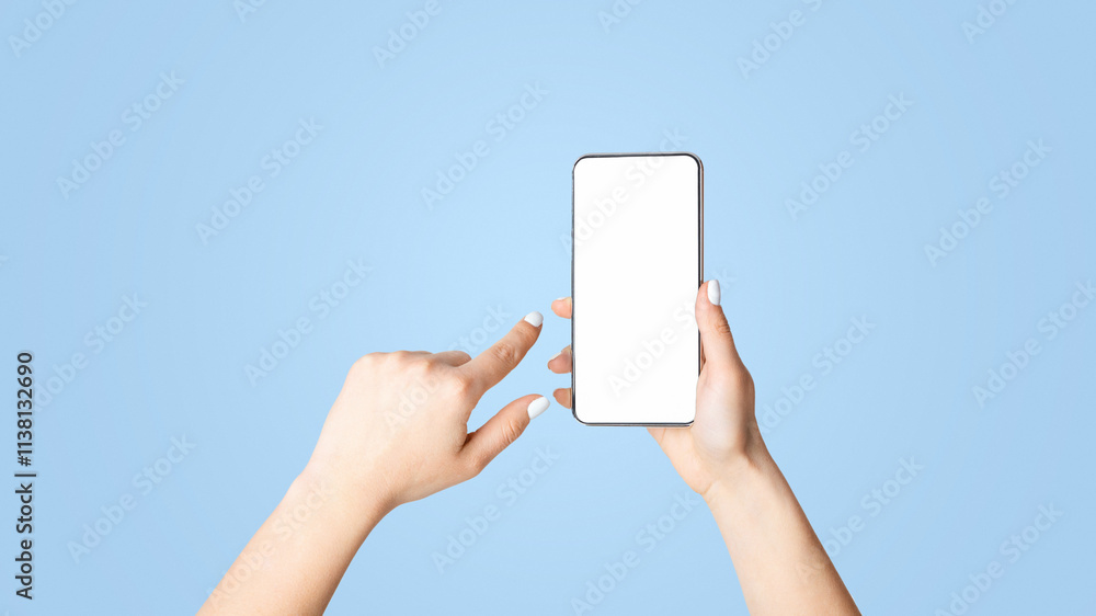 Poster unrecognizable young girl showing smartphone with empty screen over white background, mockup for mob