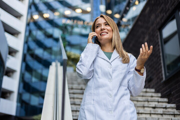Fototapeta premium Medical, phone call and nurse at outdoor by hospital for communication, contact and networking. Technology, mobile and conversation with healthcare professional for consulting, help and advice.