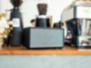 Blur background of coffee machine and coffee cup in coffee shop or cafe restaurant.