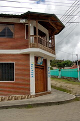 Naklejka premium Brick building on a corner in the village of Cuellaje, Ecuador, in the Intag Valley
