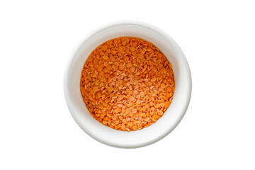 Red lentils raw, grains in bulk on white bowl, isolated on white background with clipping path