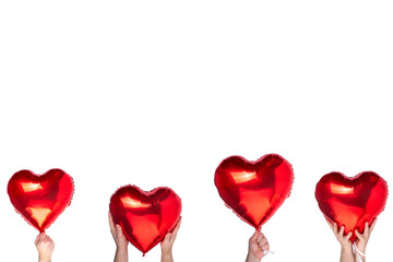 Valentine's Day holiday, February 14 background. Female male hands holding beautiful bright red...