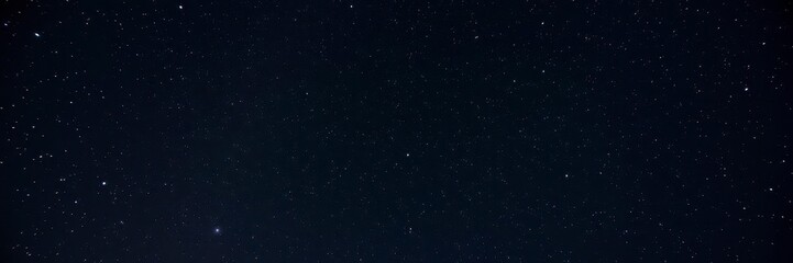 Fototapeta premium A mesmerizing view of the starry night sky, filled with thousands of twinkling stars, awe-inspiring, cosmos, astronomical