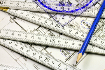 Ruler, plans, keys, pencils. Make a plan for something.