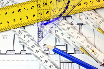 Ruler, plans, keys, pencils. Make a plan for something.