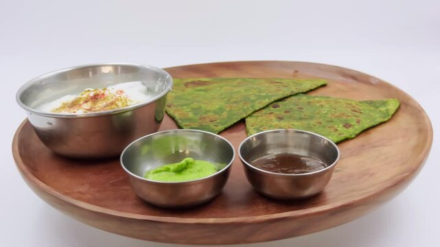 Wooden plate spinning showcasing food