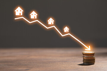 Arrow with houses. Housing market crash or decline