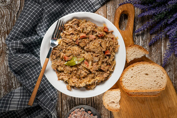 Bigos - sauerkraut stewed with meat, dried mushrooms and sausage.
