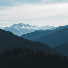 Fototapeta premium Scenic View of Mountain Range with Snowy Peaks at Sunset