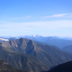 Obraz premium Scenic View of Mountain Range with Snowy Peaks at Sunset