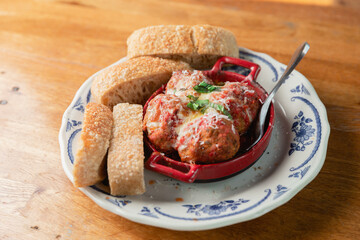 Meatballs and Bread Appetizer at a Restaurant