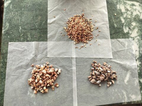 Supari a popular form of betel nut in India, where small pieces are sold in packets or pouches, often mixed with tobacco and other ingredients. Close up of small ingredients of supari 