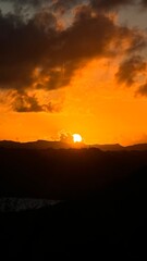 Golden sunset over landscape viewed from university building rooftop