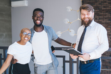 Successful salesman making deal with black customers