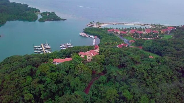 Rising aerial footage of Parrot Tree area of tropical island of Roatan, Honduras.