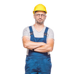 Pouting middle-aged construction worker, isolated on white background. Displeased middle-aged construction worker . Craftsman against white wall