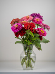 Summer bouquet. Beautiful multi colored fresh flower arrangement. Birthday bouquet made of summer flowers photographed outdoors.