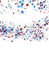 A blue glitter confetti border with red and blue stars on white
