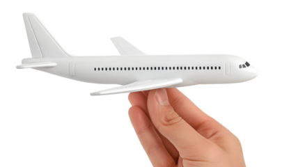 Hand holding a miniature airplane, isolated on transparent cutout background