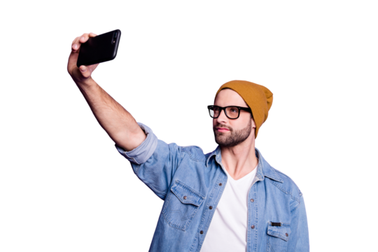 Photo of cool guy holding telephone taking selfies for instagram blog wear denim outfit isolated violet background