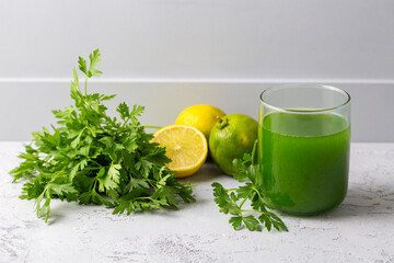 Green healthy detox, lemon and parsley juice. Green vegetable smoothie