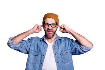 Portrait of his he nice attractive fury aggressive crazy bearded guy closing ears with fingers...