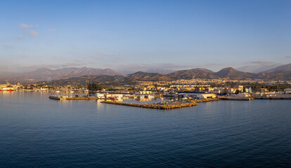 Panoramic photo of Motril, Spain taken from the water looking into town and the distant mountains early in the morning