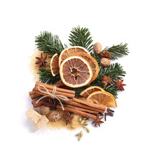 Different aromatic spices isolated on white, top view. Christmas season