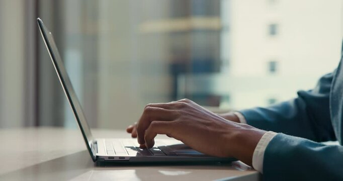 Laptop, typing and hands of business person in office for website, research project and writing email. Corporate company, professional and worker on computer for networking, internet and report - Powered by Adobe