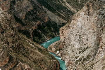 Landscape of snowy mountains, mountain range in haze summer