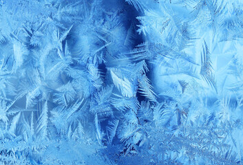 Natural frosty glass blue ice a winter close up background,  Natural frozen Pattern. Winter...