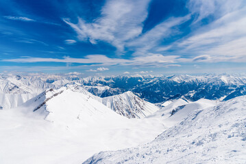 Landscape of snowy mountains, mountain range haze winter