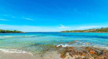 Fototapeta premium Turquoise water and rocks in a beach