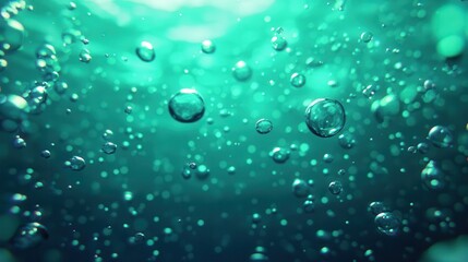 A captivating underwater scene featuring bubbles rising through turquoise water, creating a serene and tranquil ambiance.