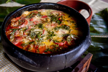 Moqueca, stew with white fish, shrimp and other types of seafood