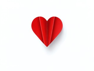 Fototapeta premium Creative red paper heart on a white background symbolizes love and affection in art and craft