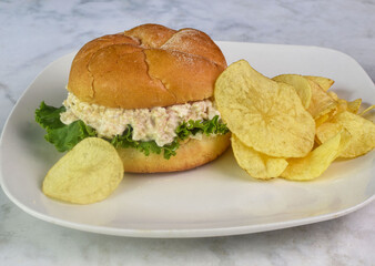 chicken salad on a bulkie roll  served with potato chips
