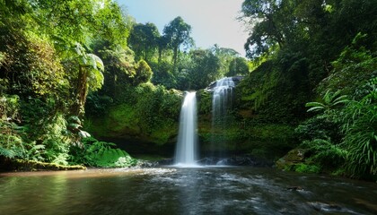 Obraz premium Tropical Waterfall Cascading into Clear beautiful nature travel destination