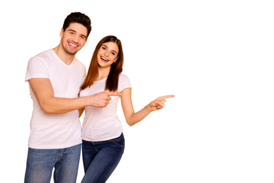Close up photo beautiful she her he him his pair wondered direct indicate fingers empty space sale discount great little low price wear casual jeans denim white t-shirts isolated yellow background