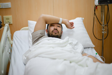 Male influenza patient is recovering in hospital.