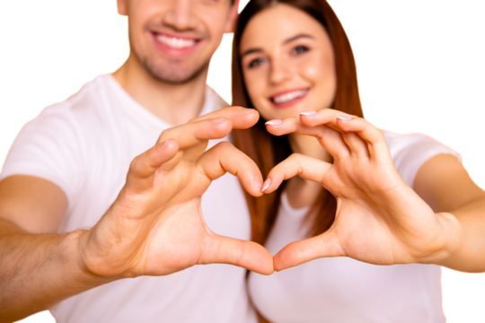 Cropped close up photo amazing beautiful she her he him his guy lady arms fingers make heart figure form romance mood hugging sincere wear casual white t-shirts outfit isolated yellow background