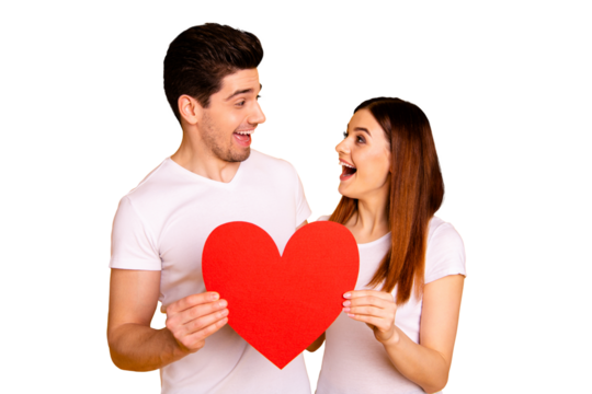 Close up photo two beautiful people she her he him his guy lady unexpected hold hands arms big heart shape paper postcard excited best emotions wear casual white t-shirts isolated yellow background