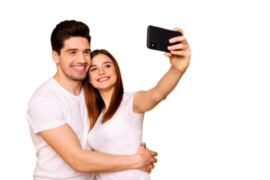 Portrait of his he her she two nice attractive lovely cheerful cheery positive people making taking selfie enjoying free time isolated over vivid shine bright yellow background